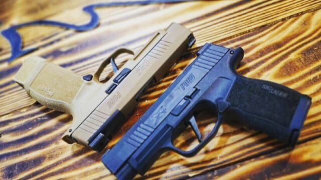 A pair of Sig Sauer P365s