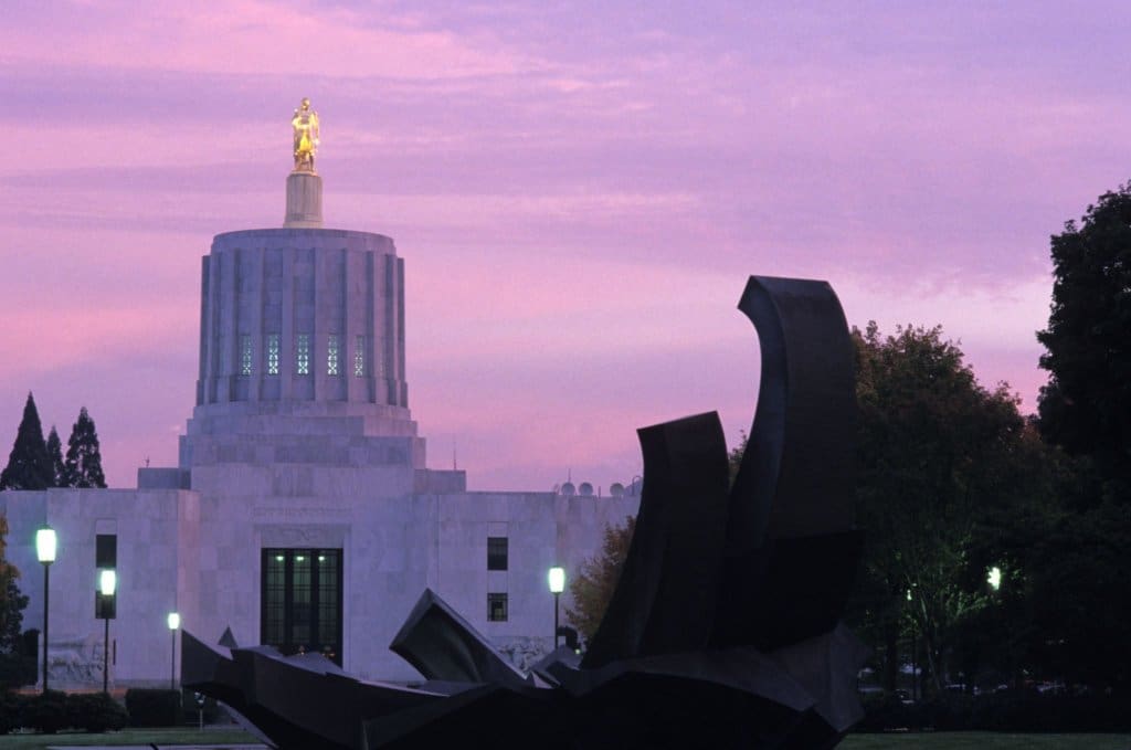 the oregon capitol building at dusk to illustrate Oregon Senate Bill 554