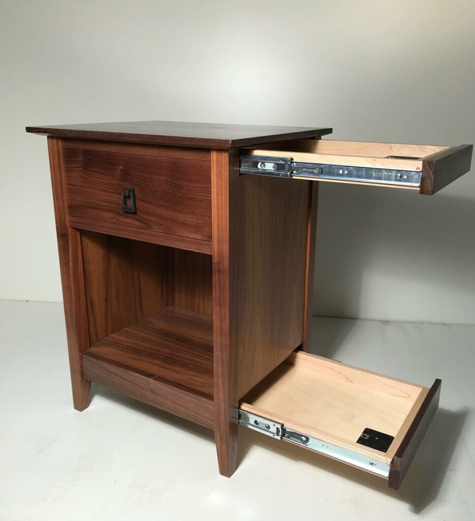 An end table that has hidden compartments for your guns to illustrate how to hide a gun safe in plain sight. Image from qlinedesign.com.